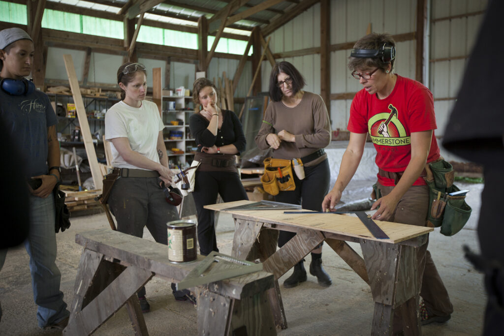 Team of woodworkers in workshop